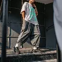 a-young-man-wearing-plain-white-over-sized-tshirt- (1).webp