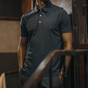 male-model-wearing-premium-polo-shirt-petrol-blue-.png