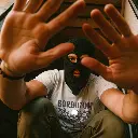 a-man-wearing-white-plain-t-shirt-and-cargo-pants- (2).webp