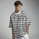 male-model-wearing-a-plain-white-oversized-t-shirt (1).webp