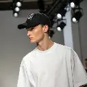 male-model-wearing-a-plain-black-sports-cap--paire.webp
