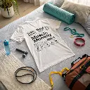 back-side-of-plain-white-tshirt-laid-on-bed-with-g (1).webp